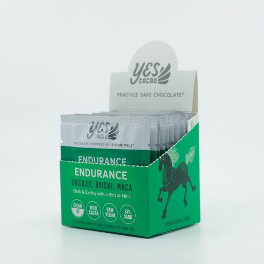 Box of YES Cacao Endurance Coins on a white background